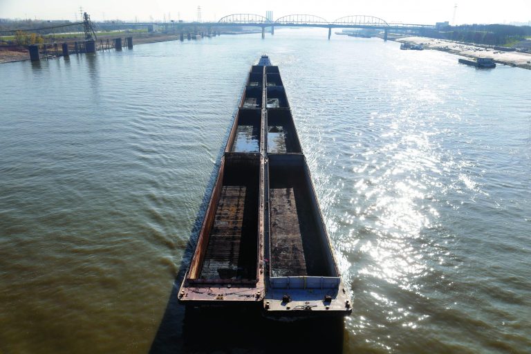 A barge powers its way up the Mississippi River Friday, Nov. 16, 2012, in St. Louis. A top Corps of Engineers official has ordered the release of water from an upper Mississippi River reservoir in an effort to avoid closure of the river at St. Louis to barge traffic due to low water levels caused by drought. (AP Photo/Jeff Roberson)