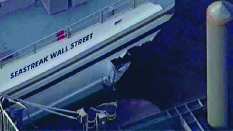 ADDS NUMBER OF PEOPLE INJURED- This aerial photo provided by WABC News Channel 7 shows damage to a commuter ferry in Lower Manhattan, Wednesday, Jan. 9, 2013, in New York. The Fire Department says at least 50 people were injured when a ferry from New Jersey struck a dock during rush hour. (AP Photo/WABC News Channel 7)