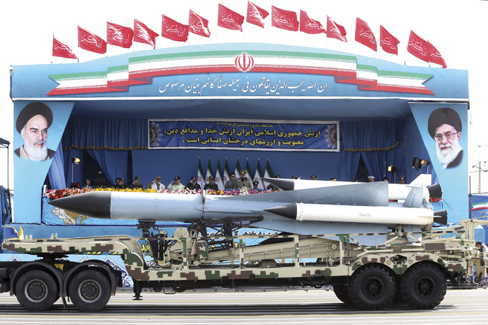 Missiles are displayed by the Iranian army in a military parade marking National Army Day in front of the mausoleum of the late revolutionary founder Ayatollah Khomeini, just outside Tehran, Iran. (AP Photo/Ebrahim Noroozi)