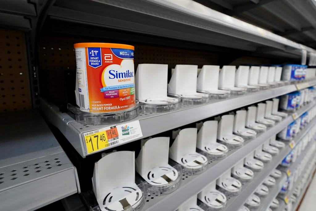 Shelves typically stocked with baby formula sit mostly empty at a store in San Antonio on May 10, 2022. Parents across America are scrambling to find baby formula because supply disruptions and a massive safety recall have swept many leading brands off store shelves.