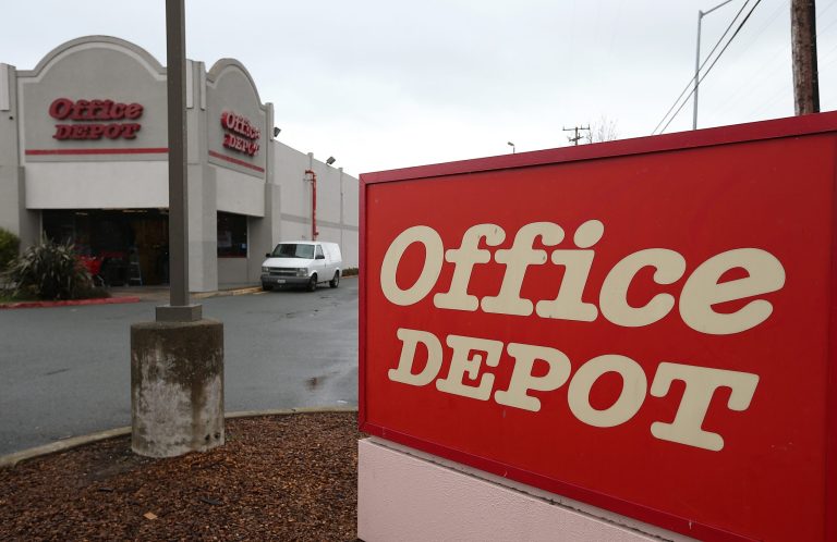 A sign is posted in front of an Office Depot store on February 19, 2013 in San Rafael, Calif. (Photo by Justin Sullivan/Getty images)