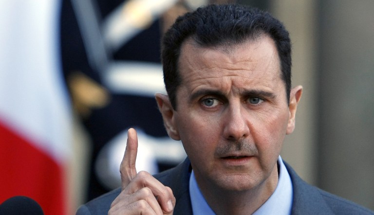 Syria President Bashar al-Assad addresses reporters following his meeting with French President Nicolas Sarkozy at the Elysee Palace in Paris, Thursday Dec. 9, 2010. 