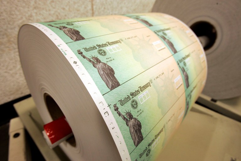 Freedom Partners, a group that advocates free-market policies and has been linked to the billionaire brothers who run Koch Industries, estimated that the gross federal debt will be nearly a quarter higher in 2040 than the Congressional Budget Office estimated earlier Tuesday. (AP Photo/Matt Rourke, File)