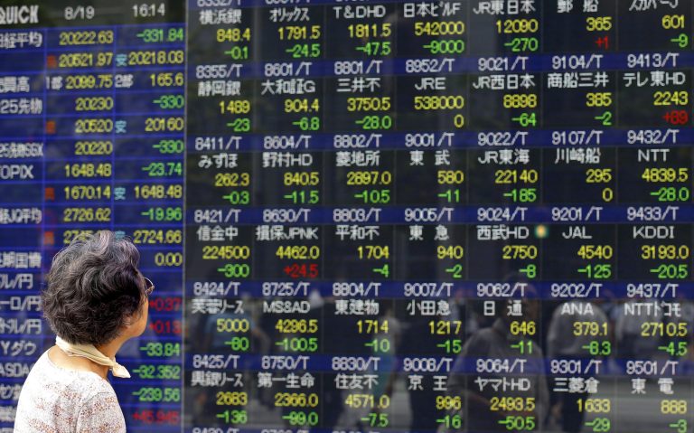 U.S. markets reeled in early morning trading, with the Dow Jones Industrial Average falling 1,000 points. (AP Photo)