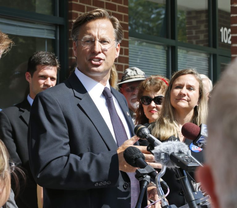 Republican 7th District congressional candidate Dave Brat gestures as he speaks during a media briefing in front of his headquarters in Richmond, Va., Thursday. (AP/Steve Helber)