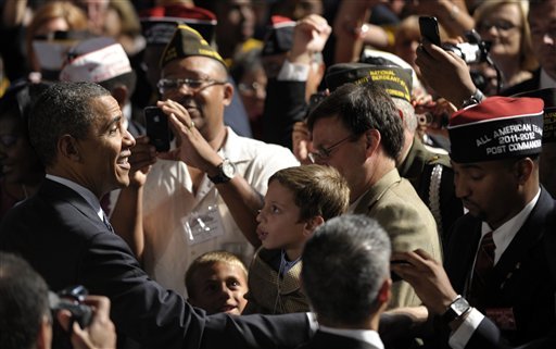 President Barack Obama greets the crowd after speaking at the 113th National Convention of the VFW in Reno, Nev. on Monday. (AP Photo)