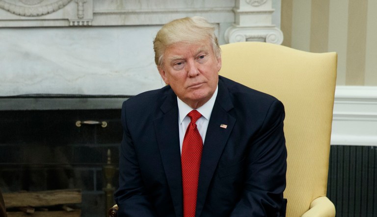 President Trump was scheduled to leave for Mar-a-Lago on Friday afternoon, but may delay his departure to his Florida estate until the Senate passes a short-term funding bill. (AP Photo/Evan Vucci, File)