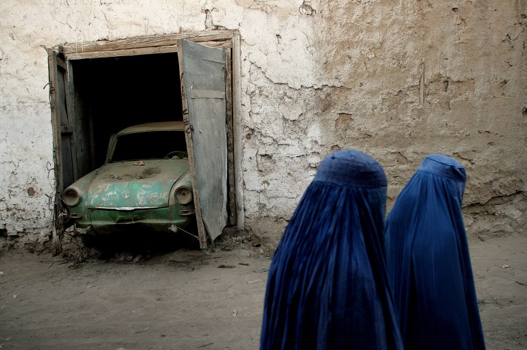 Instead of burkas, the Islamic State will force women to wear gloves and cover their eyes with gauze when entering buildings in Mosul, Iraq's second-largest city. (AP Photo)