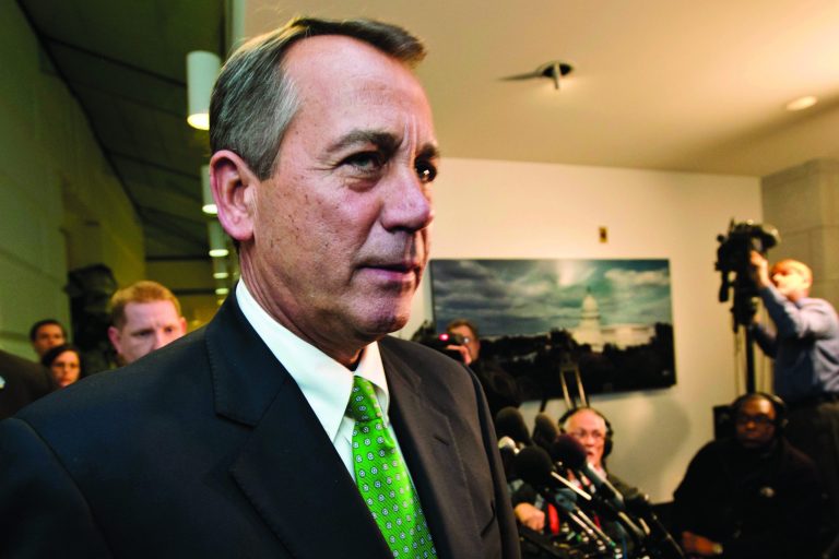 FILE - In this Jan. 1, 2013, file photo, Speaker of the House John Boehner, R-Ohio, walks past reporters after a closed-door meeting meeting of House Republicans as the 