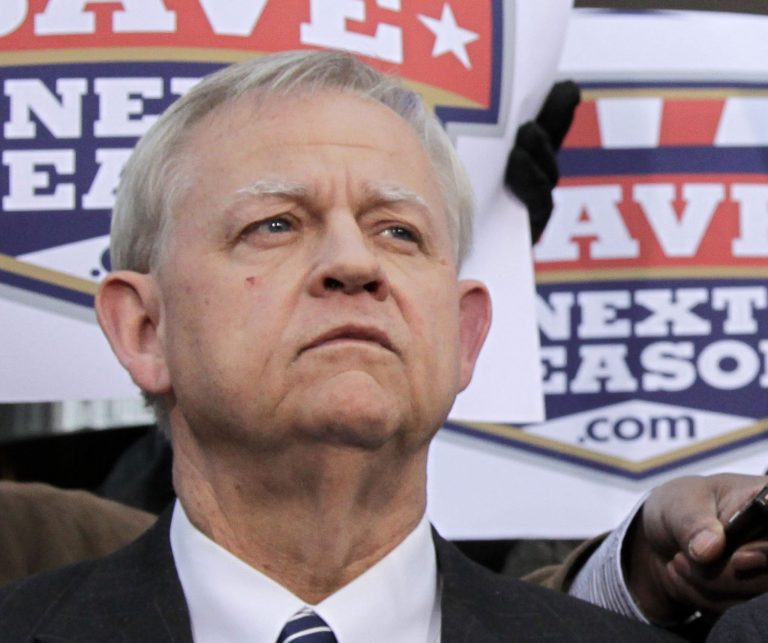 FILE - In this March 11, 2011 file photo, Scot Beckenbaugh, deputy director of the Federal Mediation and Conciliation Service listens during a news conference in Washington.Â Beckenbaugh draws a $174,000 salary for his job on K Street in Washington, yet he insists he is an Iowa resident for state tax purposes.Â (AP Photo/J. Scott Applewhite, File)