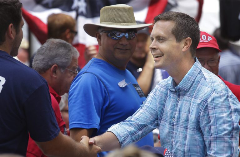 Rep. Rodney Davis, R-Illinois, shakes hands with people attending the Republican Day rally at the Illinois State Fair in Springfield. (AP Photo/Seth Perlman, File)
