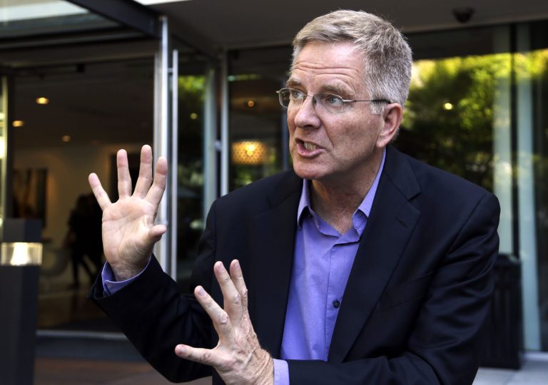 Rick Steves, one of the country's most visible advocates of marijuana legalization, speaks during an interview in Portland, Ore., Tuesday, Oct. 7, 2014. Steves is in the midst of a 10-city tour to stump for legal pot in Oregon. (AP Photo/Don Ryan)