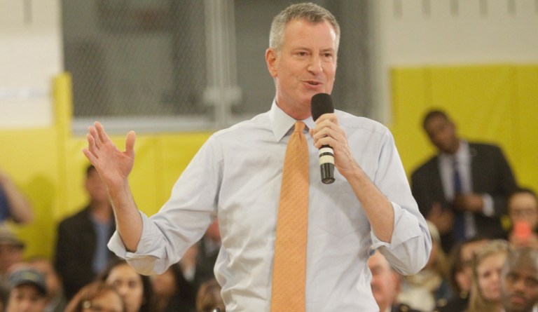 New York City Mayor Bill de Blasio speaks during a Town Hall meeting at the Gregorio Luperon High School for Science and Mathematics Wednesday, Oct. 14, 2015, in New York. 