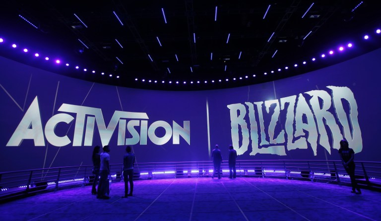 FILE - This June 13, 2013 file photo shows the Activision Blizzard Booth during the Electronic Entertainment Expo in Los Angeles.