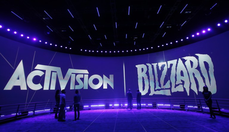 FILE - This June 13, 2013 file photo shows the Activision Blizzard Booth during the Electronic Entertainment Expo in Los Angeles. 