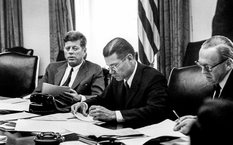 President John F. Kennedy, Secretary of Defense Robert McNamara, and Deputy Secretary of Defense Roswell Gilpatric meet Oct. 29, 1962 in the White House cabinet room during the Cuban Missile Crisis.