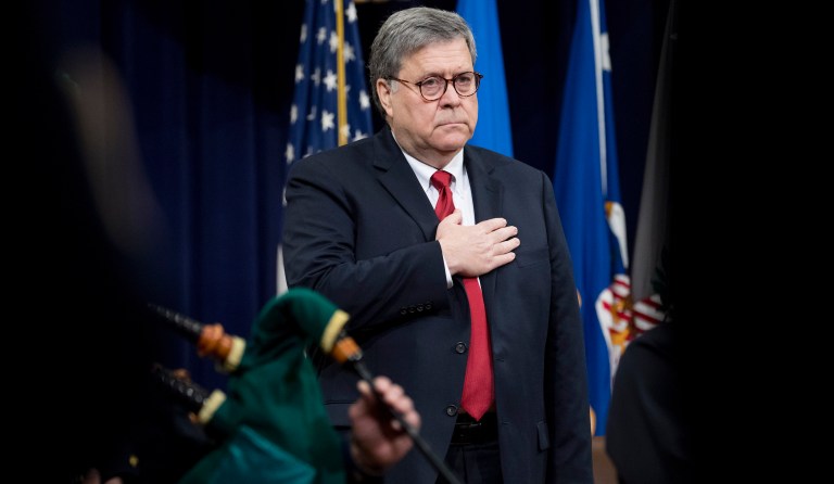 Attorney General William Barr appears on stage at the beginning of the U.S. Attorneys' National Conference at the Department of Justice in Washington, Wednesday, June 26, 2019. 