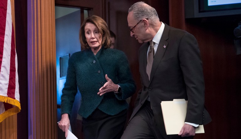 House Minority Leader Nancy Pelosi, D-Calif., and Senate Minority Leader Chuck Schumer, D-N.Y., arrive to speak to reporters on Capitol Hill in Washington, March 22, 2018. 