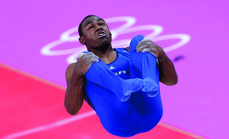 U.S. cruises to lead in men’s gymnastics qualifying
