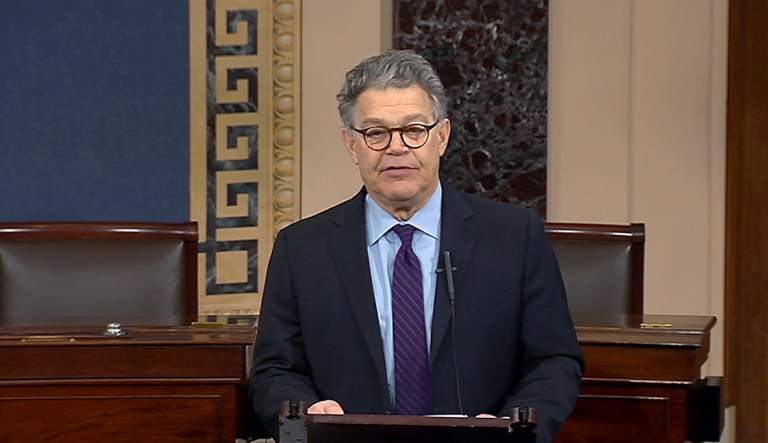 Twenty-two Democrats and one Republican, Sen. Jeff Flake, listened to Al Franken's goodbye note to the Senate. (Senate TV via AP)