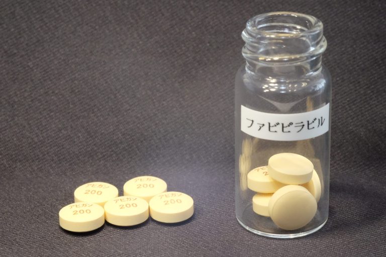 In this undated photo released by Fujifilm Holdings Corp., anti-influenza tablets fabipiravir are shown. Japan said Monday, Aug. 25, 2014 it is ready to provide a Japanese-developed anti-influenza drug as potential treatment to fight the rapidly expanding Ebola outbreak. The drug, developed by a Fujifilm subsidiary Toyama Chemical Co. to treat novel and re-emerging influenza viruses, was approved by the Japanese health ministry in March. Fujifilm is in talks with the U.S. Food and Drug Administration on clinical testing of the drug in treating Ebola, company spokesman Takao Aoki said. The label reads: fabipiravir.  (AP Photo/Fujifilm Holdings Corp.)