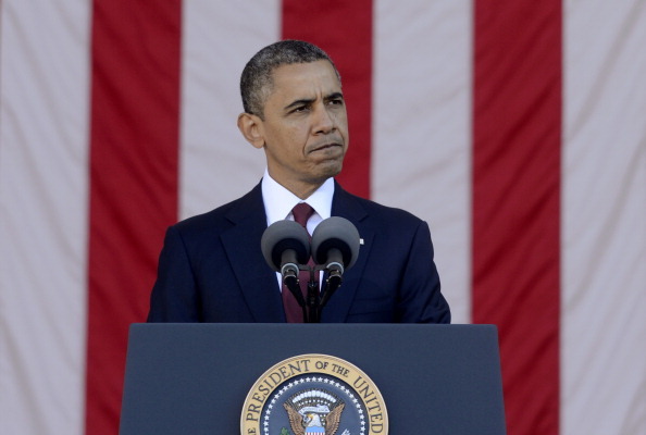 ARLINGTON, VA - NOVEMBER 11: U.S. President Barack Obama spaeks after a wreath-laying ceremony on Veteran's Day at the Tomb of the Unknown Soldier in Arlington National Cemetery on November 11, 2012 in Arlington, Virginia. (Photo by Michael Reynolds-Pool/Getty Images)
