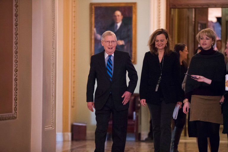 Senate Majority Leader Mitch McConnell, R-Ky., returns to his office as the federal shutdown enters Day 2 amid a partisan blame game on both sides, at the Capitol in Washington, Sunday, Jan. 21, 2018. (AP Photo/J. Scott Applewhite)