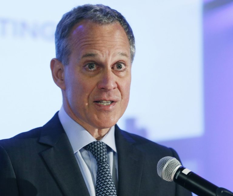 FILE - In this Sept. 19, 2014 file photo, New York State Attorney General Eric Schneiderman, running for re-election, speaks during the annual meeting of the Business Council of New York State at the Sagamore Resort, in Bolton Landing, N.Y. Schneiderman faces Republican challenger John Cahill in the November election. (AP Photo/Mike Groll, File)