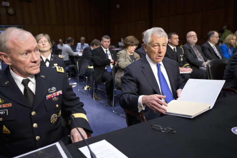 Defense Secretary Chuck Hagel, right, and Joint Chiefs Chairman Gen. Martin Dempsey testify on Capitol Hill in Washington, Wednesday, April 17, 2013, before the Senate Armed Services Committee hearing on the Pentagon's budget for fiscal 2014 and beyond. (AP Photo/J. Scott Applewhite)