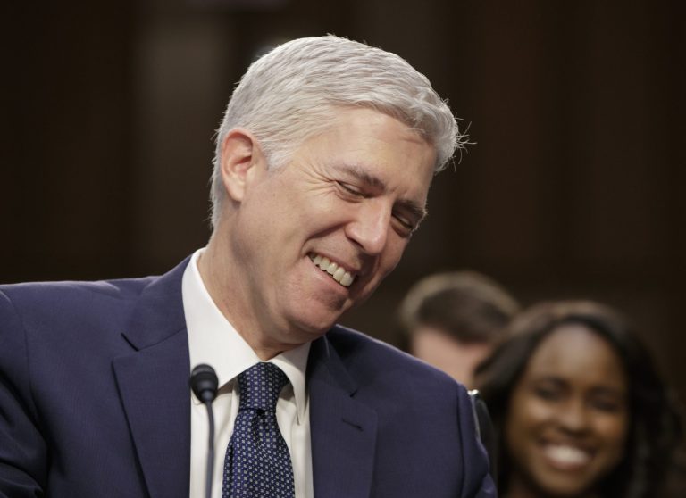 Supreme Court Justice nominee Neil Gorsuch laughs as testifies on Capitol Hill in Washington, Wednesday, March 22, 2017, at his confirmation hearing before the Senate Judiciary Committee. (AP Photo/J. Scott Applewhite)
