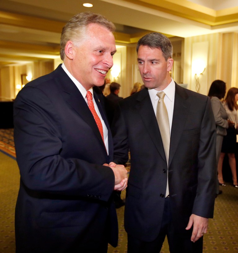 Virginia gubernatorial hopefuls Democrat Terry McAuliffe, left, and Republican Ken Cuccinelli shake hands before a luncheon in Richmond, Va., in May. (AP/Richmond Times-Dispatch/Joe Mahoney)