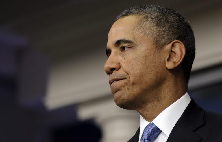 President Barack Obama pauses while speaking about Ukraine, Monday, March 17, 2014, in the James Brady Press Briefing Room at the White House in Washington. The president imposed sanctions against Russian officials, including advisers to President Vladimir Putin, for their support of Crimea's vote to secede from Ukraine. (AP Photo/Susan Walsh)