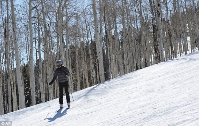 The first lady and her daughters have taken Spring Break on the slopes of Aspen, Colorado. This picture is from their 2012 trip. AP Photo.
