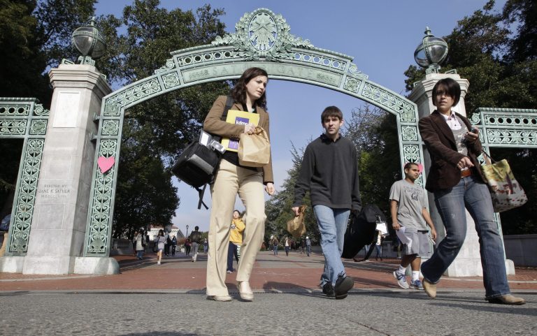 University of California, Berkeley students walk through Sather Gate. A column by a reader of applications at the college has raised questions about discrimination in college admissions. (AP File)