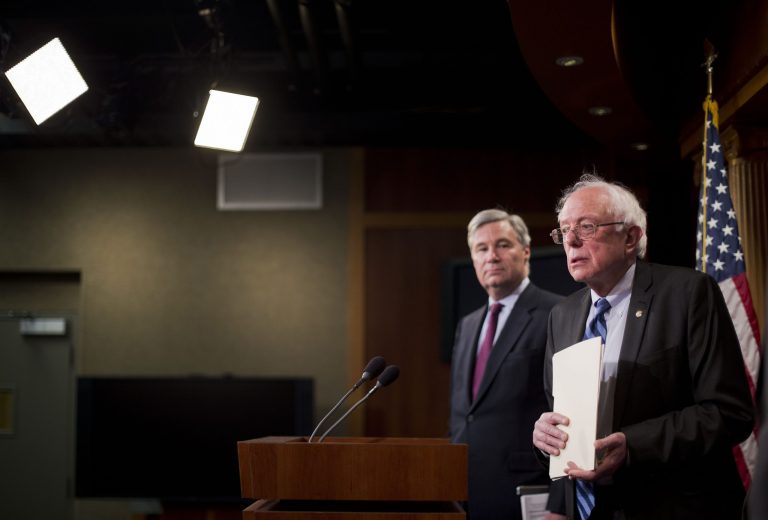 Sen. Bernie Sanders, I-Vt., ranking member on the Senate Budget Committee, right, accompanied by fellow committee member Sen. Sheldon Whitehouse, D-RI., speaks during a news conference on Capitol Hill in Washington, Wednesday, March 11, 2015, to discuss the budget. (AP Photo/Pablo Martinez Monsivais)