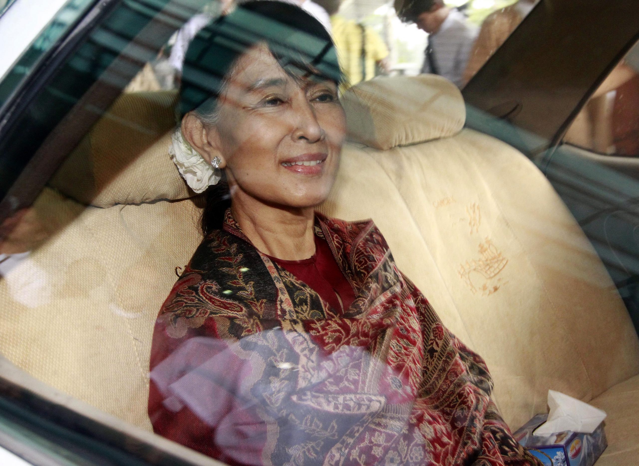 Myanmar state press lauds Suu Kyi’s cooperation