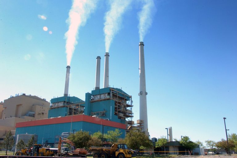 This July 1, 2013 file photo smoke rises from the Colstrip Steam Electric Station, a coal burning power plant in in Colstrip, Mont. (AP Photo)