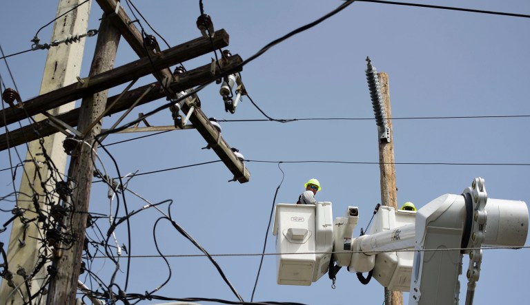 In January, several thousands of workers from the U.S. mainland will arrive in Puerto Rico to help fix the island's electric grid. (AP Photo/Carlos Giusti)