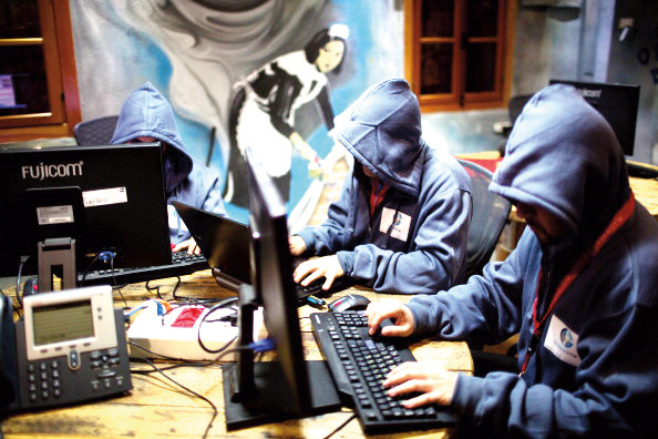 The volume of successful attacks is a sobering jolt, yet most companies fail to buy insurance to transfer the loss to an insurance company. (MENAHEM KAHANA/AFP/Getty Images)