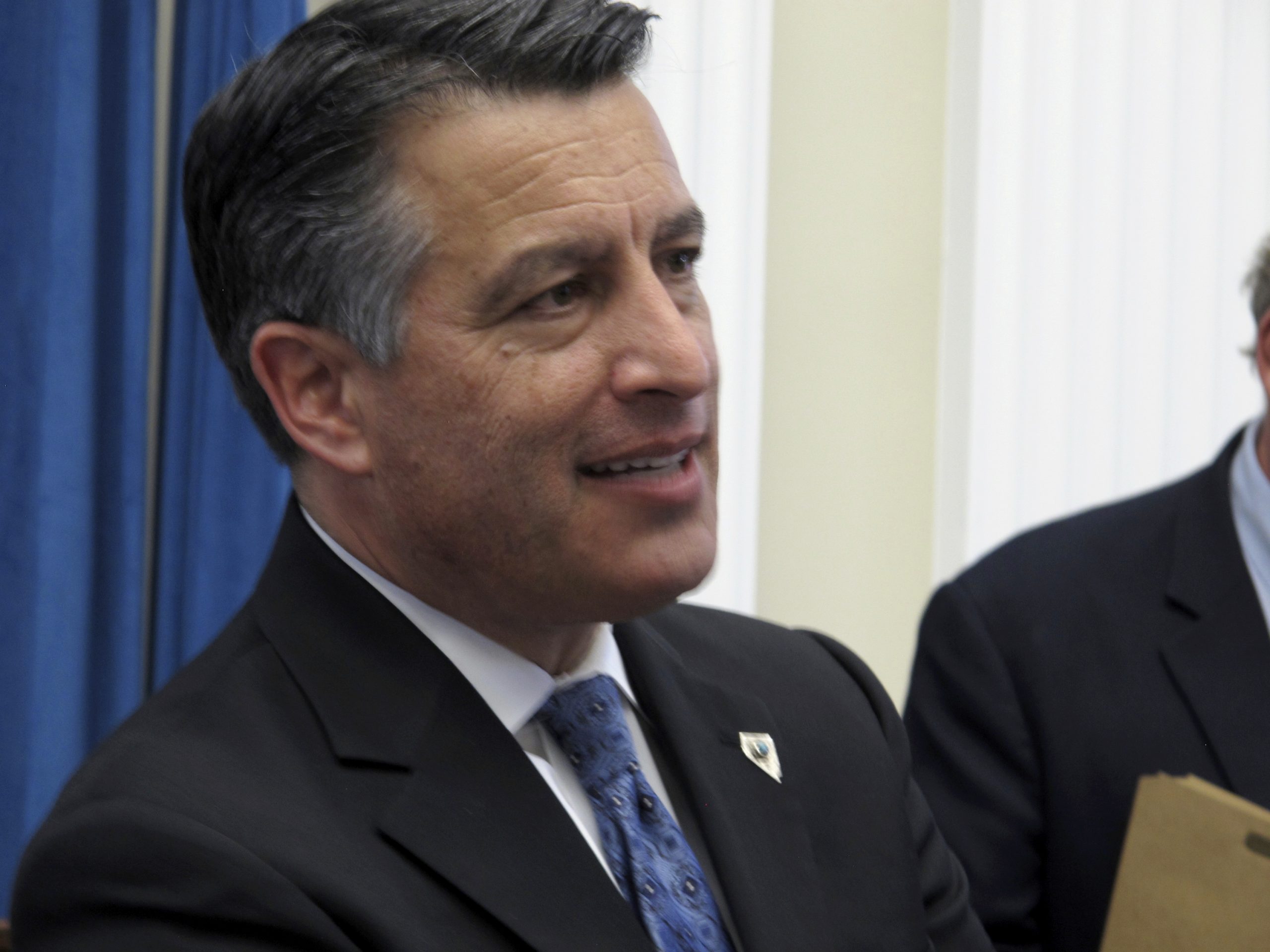 Drone delivers gavel to new National Governors Association chair Brian Sandoval