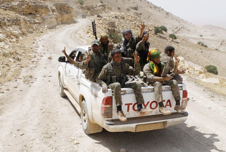 The Islamic State is lowering its conscription age to recruit boys as young as 10 years old. (The Kurdish fighters of the People's Protection Units via AP, File)