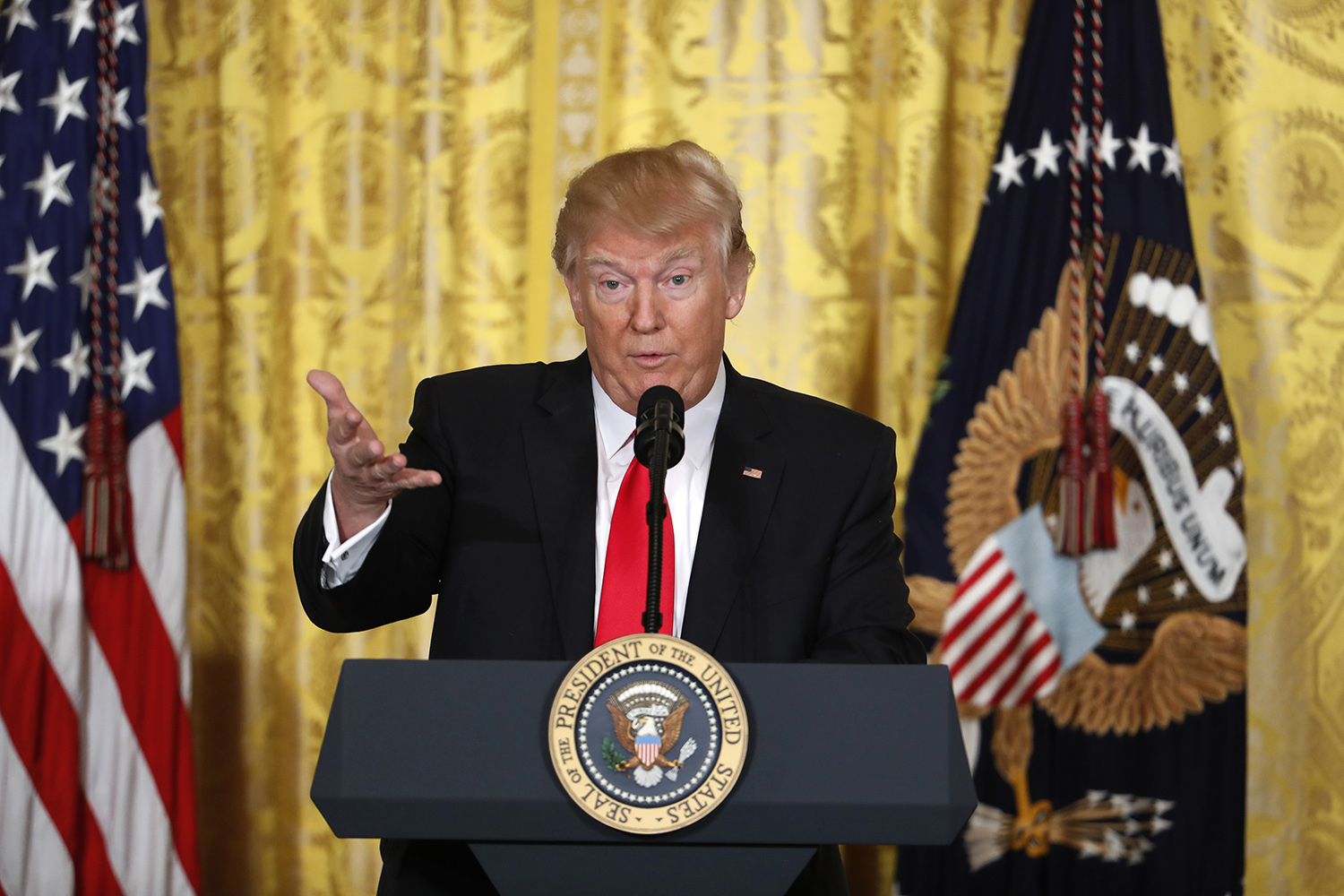 Trump slashes and burns, assailing the media and defending his presidency