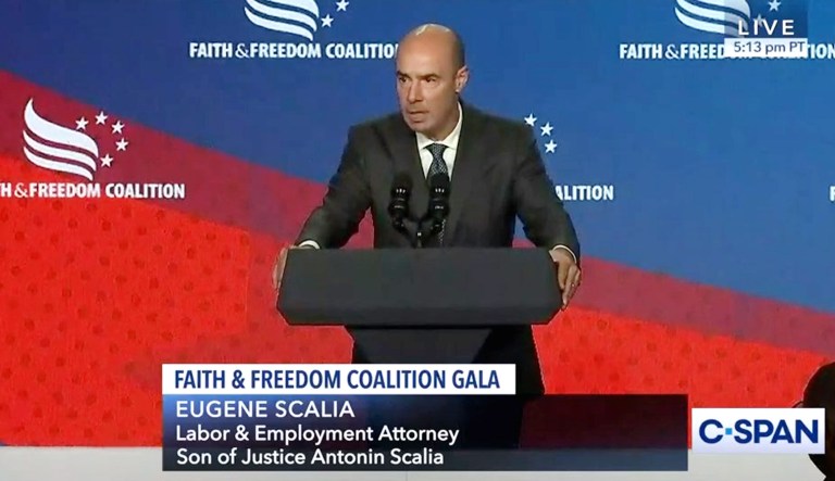 Eugene Scalia speaks at an event.