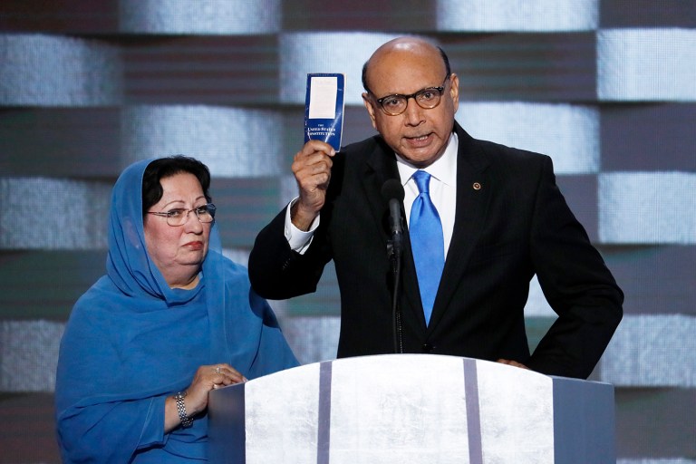 Khizr Khan, father of fallen US Army Capt. Humayun S. M. Khan, holds up a copy of the Constitution of the United States during the Democratic National Convention in Philadelphia. (AP Photo/J. Scott Applewhite)