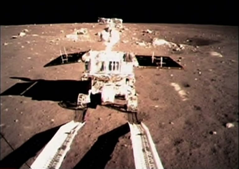 FILE - In this Dec. 15, 2013 file photo taken by the on-board camera of the lunar probe Chang'e-3 and made off the screen of the Beijing Aerospace Control Center in Beijing, China's first moon rover 