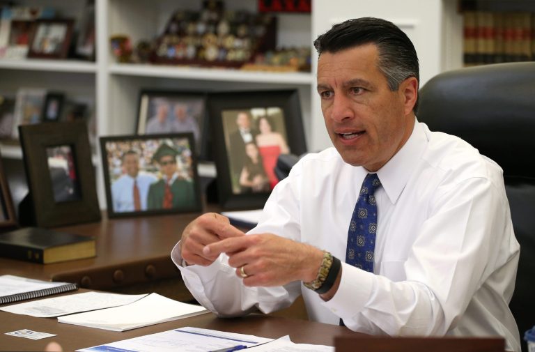 There are two bills pending in the Republican-controlled legislature. If passed and signed by GOP Gov. Brian Sandoval, Nevada Republicans voting in the 2016 primary would pull the lever at the polls as they do in a general election. (AP Photo)