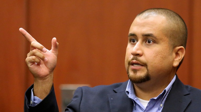 FILE - In this Tuesday, Sept. 22, 2015 file photo,George Zimmerman gestures during his testimony at a hearing for accused shooter Matthew Apperson in Seminole circuit court in Sanford, Fla. (Joe Burbank/Orlando Sentinel via AP, Pool, File)