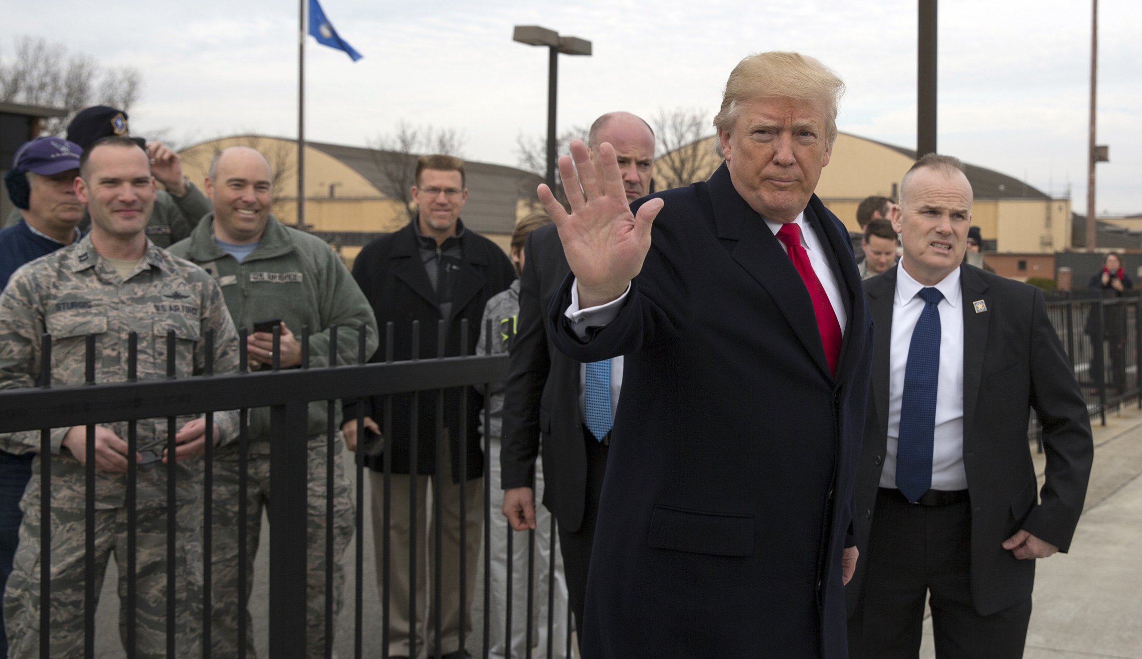Trump greets military service members, families en route to Mar-a-Lago