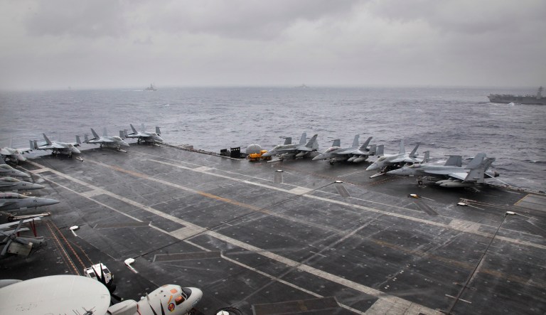 Carrier Strike Groups offers two opportunities: diplomatic messaging and military destruction. (AP Photo/Rishi Lekhi)