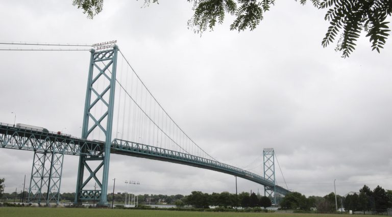   FILE - In a June 24, 2011 file photo, the Ambassador Bridge, spanning the Detroit River and linking the U.S. and Canada, is seen from Detroit. Michigan Republican House lawmakers on Wednesday, June 13, 2012 attempted to block the governor from spending state money to build another bridge across the Detroit River. The House Appropriations Committee approved a supplemental budget that would prohibit using state money unless the Legislature authorizes construction of the bridge. (AP Photo/Carlos Osorio, File)  
